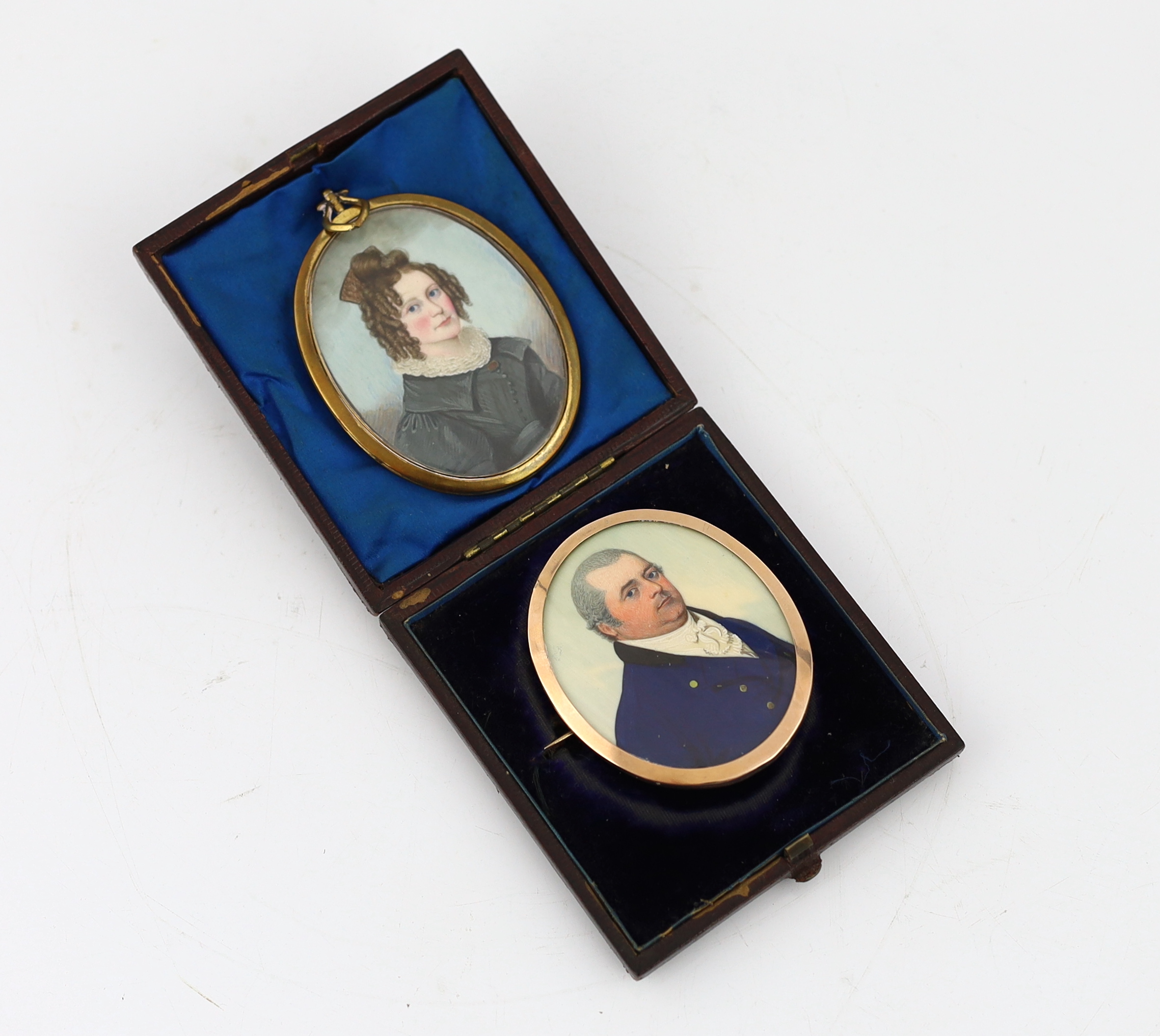 English School circa 1820, Portrait miniatures of a husband and wife, watercolour on ivory (2), 6 x 5cm. & 6.8 x 5cm. CITES Submission reference 34M3AYPS